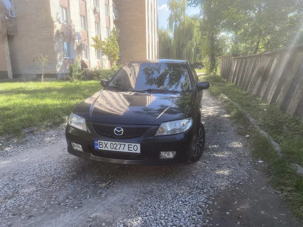 Фото 2003 Mazda 323