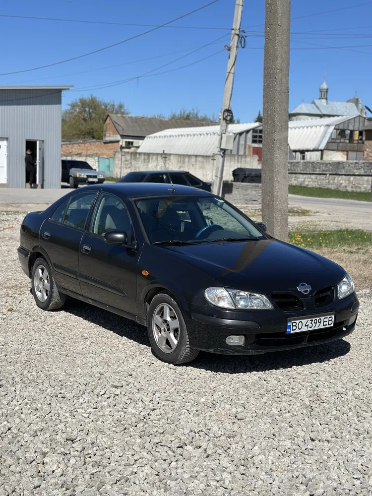 Фото 2002 Nissan Almera